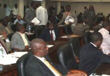 Incertitudes à la chambre basse avant le vote sur le salaire minimum